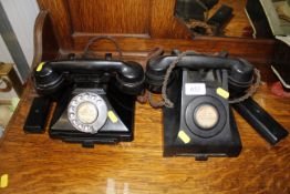 A vintage rotary dial telephone and one other