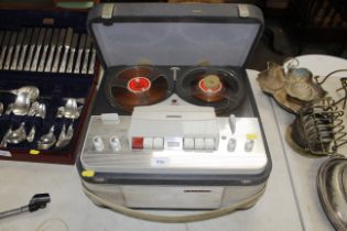 A Phillips reel to reel tape player, sold as a col