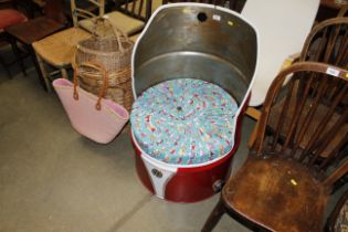 A tub chair formed from an oil drum in the form of a VW Campervan