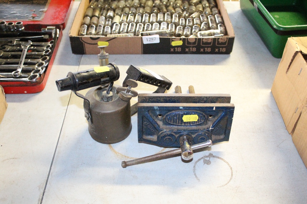 A vintage brass blow lamp together with a small be