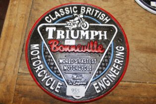 A reproduction metal Triumph Bonneville advertisin