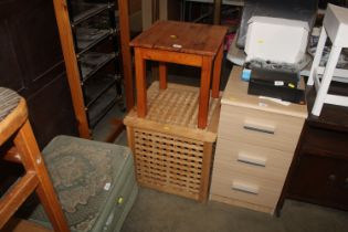 A pine occasional table and a linen basket