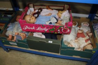 Four boxes of vintage and other dolls