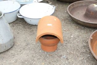 A terracotta chimney cowl