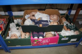 Four boxes of vintage and other dolls