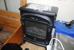 A Silver Crest log effect electric fire
