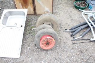 A quantity of lawn tractor tyres and wheelbarrow t