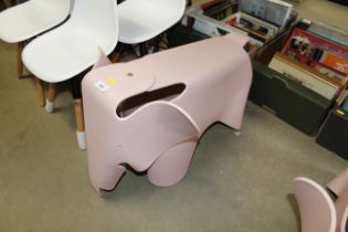 An Eames style stool in the form of an elephant