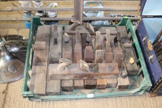 A plastic tray of large wooden planes