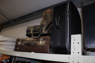 A vintage case and various bags