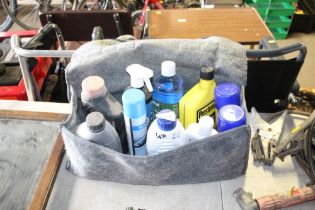 A car comfort bag and contents of various oil, win