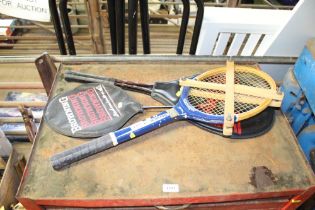 A quantity of badminton racquets