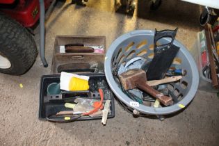 A wooden box of various shoe cleaning brushes toge