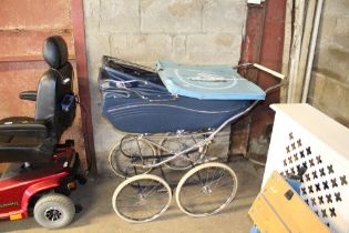 A Marmet pram with Morelands pram canopy in origin