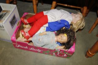 A box of vintage and other dolls