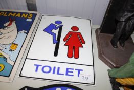 An enamel toilet sign (242)