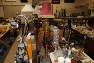 A gilt brass lamp standard and shade