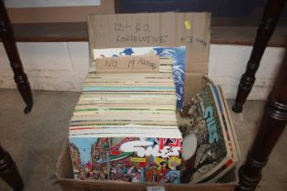 A box of Giles annuals