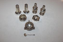 Two pairs of silver salt and pepper pots; and thre