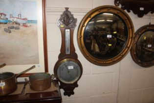 An oak cased banjo barometer