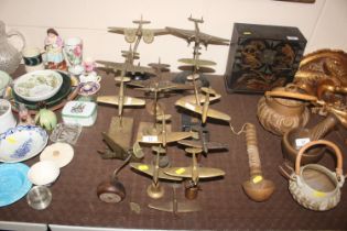 Fifteen various WWII brass aeroplane models, most