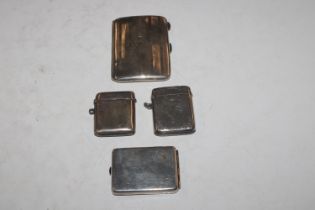 A silver cigarette case and three silver vesta cas