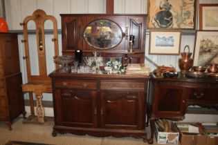 A late 19th Century mahogany mirrored back sideboa