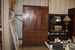 A 19th Century walnut linen press fitted two short