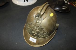 A French early 20th Century brass fireman's helmet