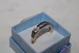 A T.G.G.C. Sterling silver gilt and tanzanite ring
