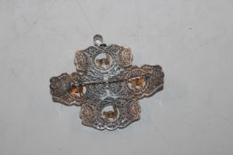 An 18ct gold and silver brooch, approx. 15gms