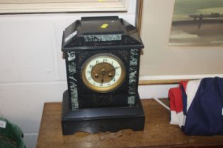 A Victorian slate mantel clock with eight day move