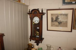 A Vienna wall clock with eight day movement