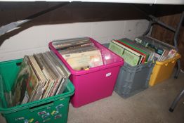 Four plastic crates of various records