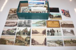 A box of various modern and vintage post-cards