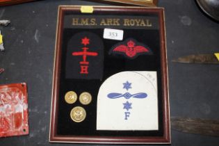 A WWII Royal Naval cloth badge collection mounted