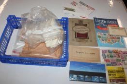 A plastic crate of various stamps, post-cards and Royal ephemera