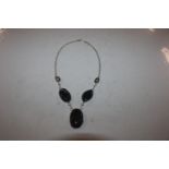 A vintage Sterling silver fossilised black coral a