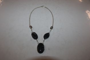 A vintage Sterling silver fossilised black coral a