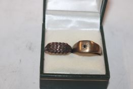 A 9ct gold gypsy ring AF; and a 9ct gold keeper ri