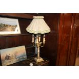 A four branch onyx table lamp and shade