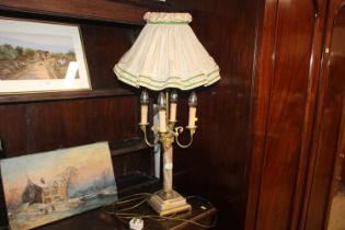 A four branch onyx table lamp and shade