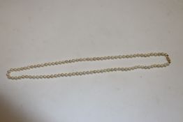 A 28" Uniform cultured pearl necklace with 14ct go