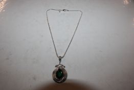 A large Sterling silver and chrome diopside pendan