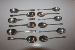A set of six silver seal top teaspoons; and one ot