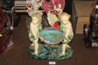 A Minton Majolica Putti sweetmeat dish AF