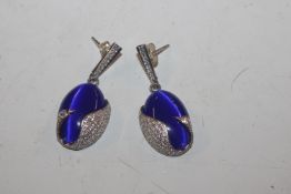 A pair of large Sterling silver Swarovski style dr
