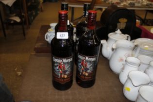 Two bottles of Captain Morgan's dark Rum