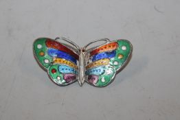 A vintage enamelled Sterling silver brooch in the