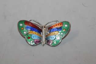 A vintage enamelled Sterling silver brooch in the